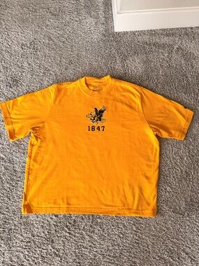 Nike Women’s Golden Yellow Graphic Tee